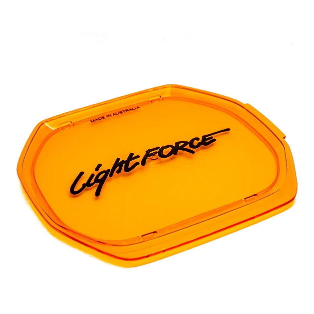 Amber Lightforce lens cover for the BEAST, translucent orange with the Lightforce script raised in black across the face and MADE IN AUSTRALIA embossed along the top edge