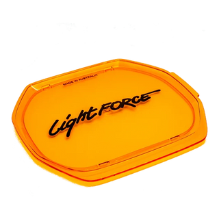Amber Lightforce lens cover for the BEAST, translucent orange with the Lightforce script raised in black across the face and MADE IN AUSTRALIA embossed along the top edge