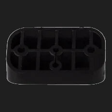 Small black moulded rubber mounting pad seen from underneath, showing the internal ribbing and the three fixing holes through the base – Lightforce ROK9 30° Angled Base
