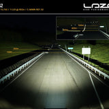 High-performance lighting system demonstration on a road at night with Lazer branding.