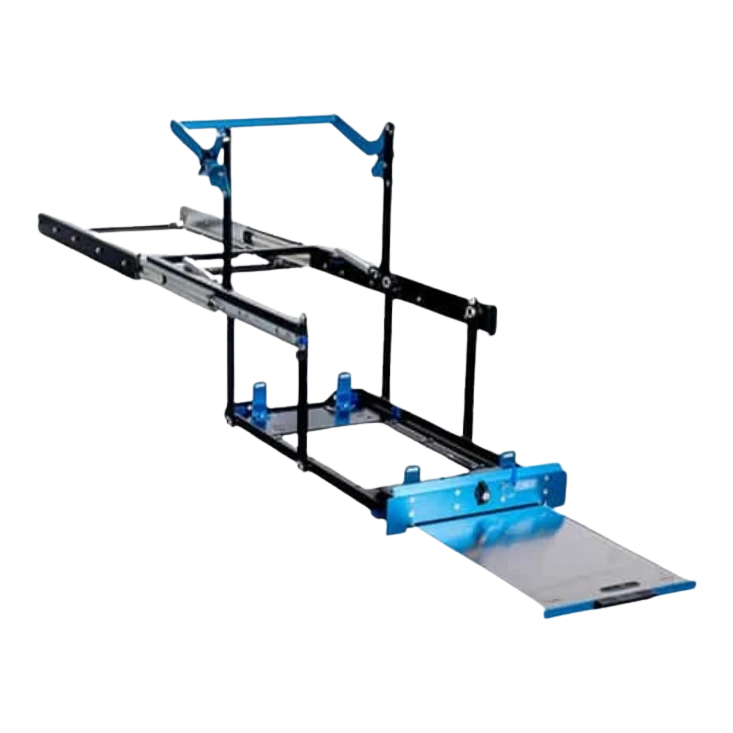MSA drop slide with no fridge fitted, seen from above and behind with the sliding table extended, showing the drop-arm linkage, the four fridge stops on the tray and the blue front panel