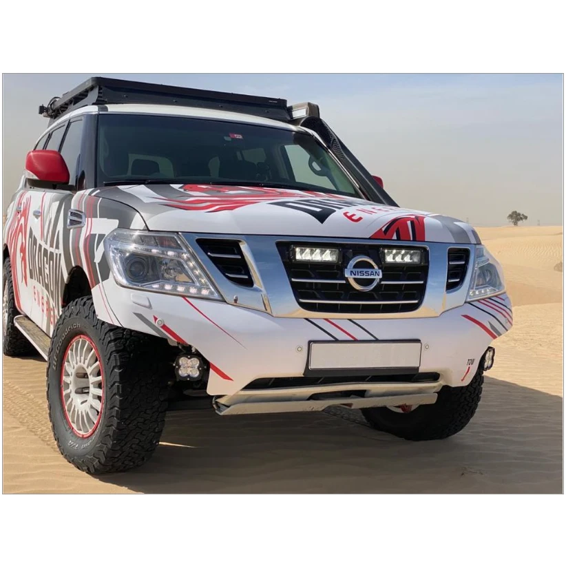 Nissan vehicle with a colorful wrap on a desert background