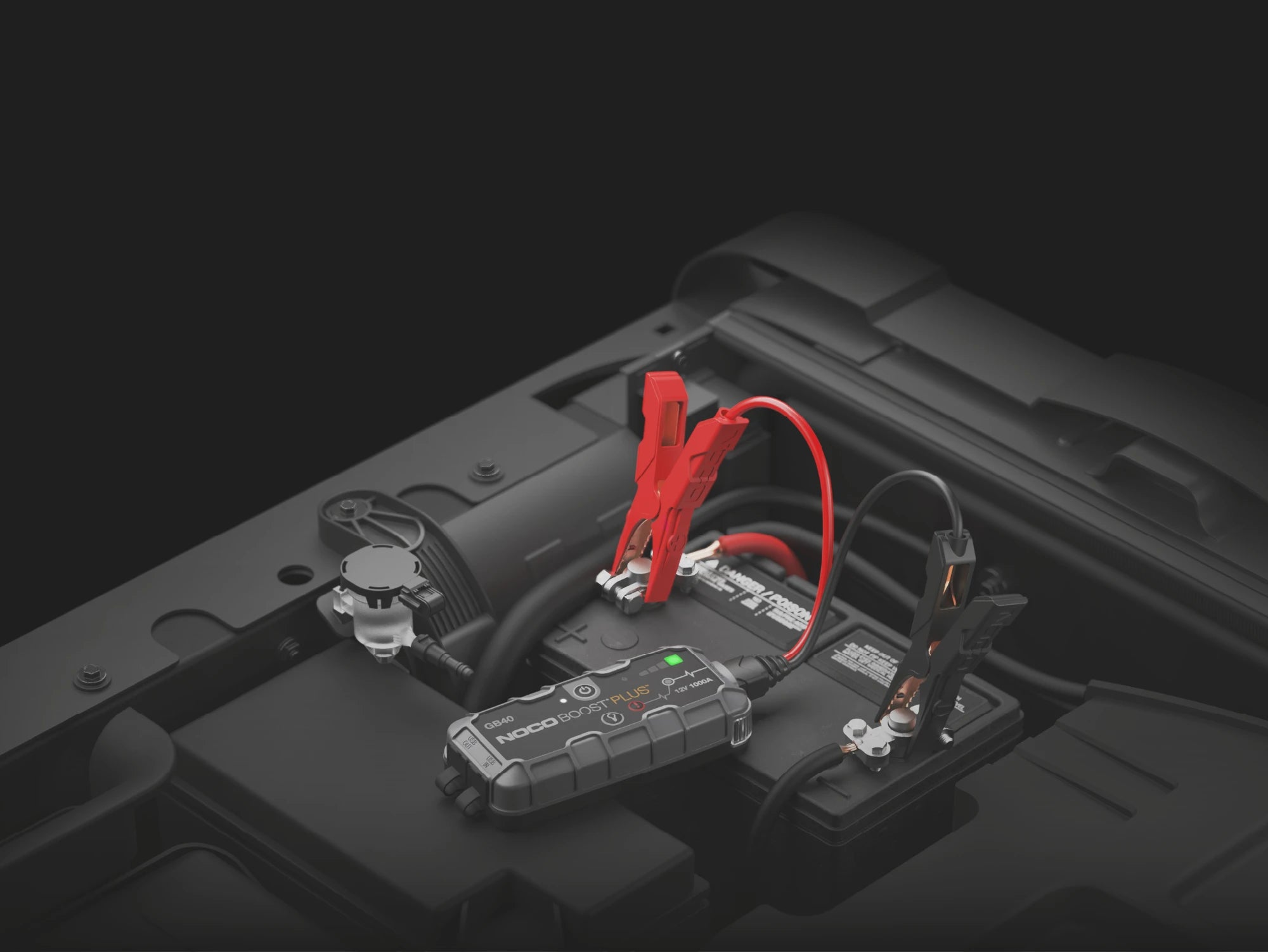 Noco 12V 1000A UltraSafe Lithium Jump Starter – jump starting a vehicle in the engine bay