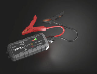 Noco 12V 1500A UltraSafe Lithium Jump Starter Boost XL – jump starter with clamps and flashlight on