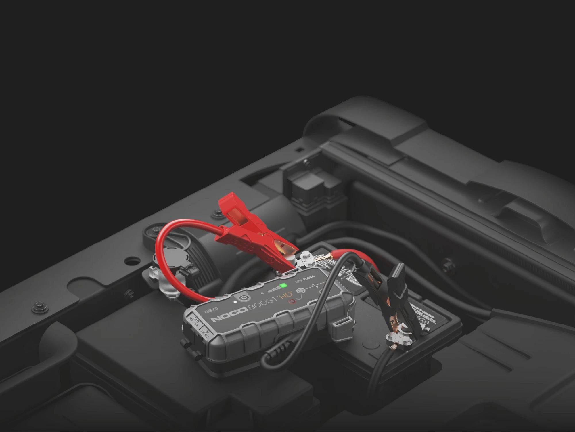 Noco 12V 2000A UltraSafe Lithium Jump Starter – jump starting a vehicle in the engine bay