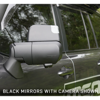 Car side mirror with built-in camera on a vehicle, surrounded by greenery – Prado 250 MSA POWER FOLD Towing Mirrors