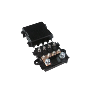 Four-way midi fuse holder with the black cover lifted off and set behind it, showing the four fuse positions, the copper link bar across the terminals and the studs and nuts on the moulded base