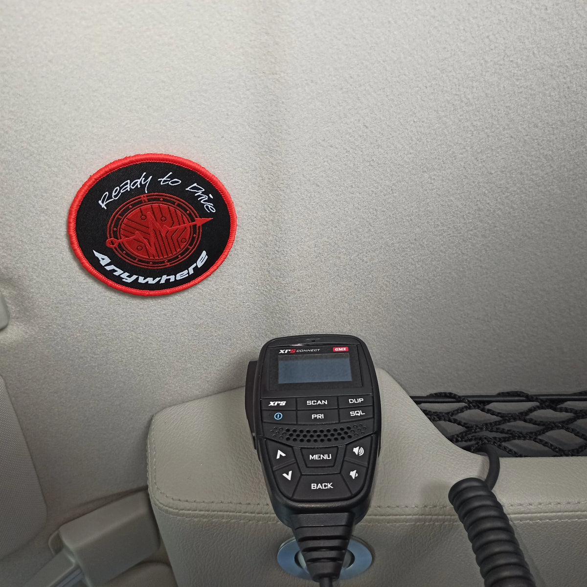 Ready to Drive Anywhere Velcro Patch fitted to a car headliner