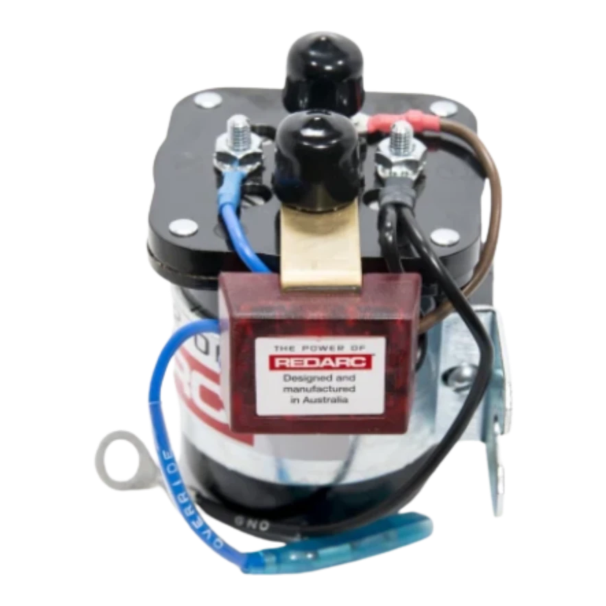 Redarc SBI212 isolator from the front with the mounting bracket fitted, the red control module labelled designed and manufactured in Australia, the blue override lead and the black earth lead with its ring terminal