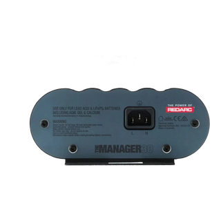 AC input end of the REDARC Manager30 showing the IEC mains socket and the label listing supported battery types