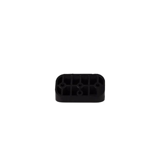 Small black moulded rubber mounting pad seen from underneath, showing the internal ribbing and the three fixing holes through the base