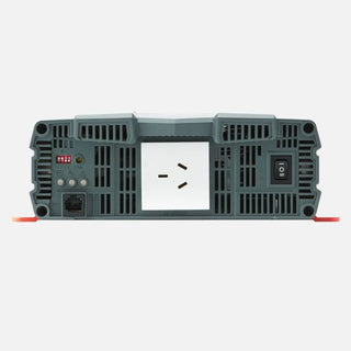 AC end of the Redarc pure sine wave inverter, with a single Australian three-pin outlet in the centre, the on-off-remote rocker switch at the right, the status indicator lights and configuration DIP switches at the left, and an RJ45 trigger socket below them