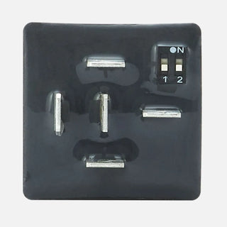 Pin side of the REDARC Multi Function Timer showing the five spade terminals and the DIP switch marked 1 and 2