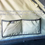 Two large storage pouches on a tent with text indicating their location.