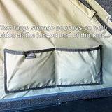 Two large storage pouches on a tent with text indicating their location.