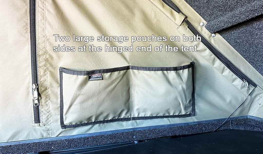 Two large storage pouches on a tent with text indicating their location.