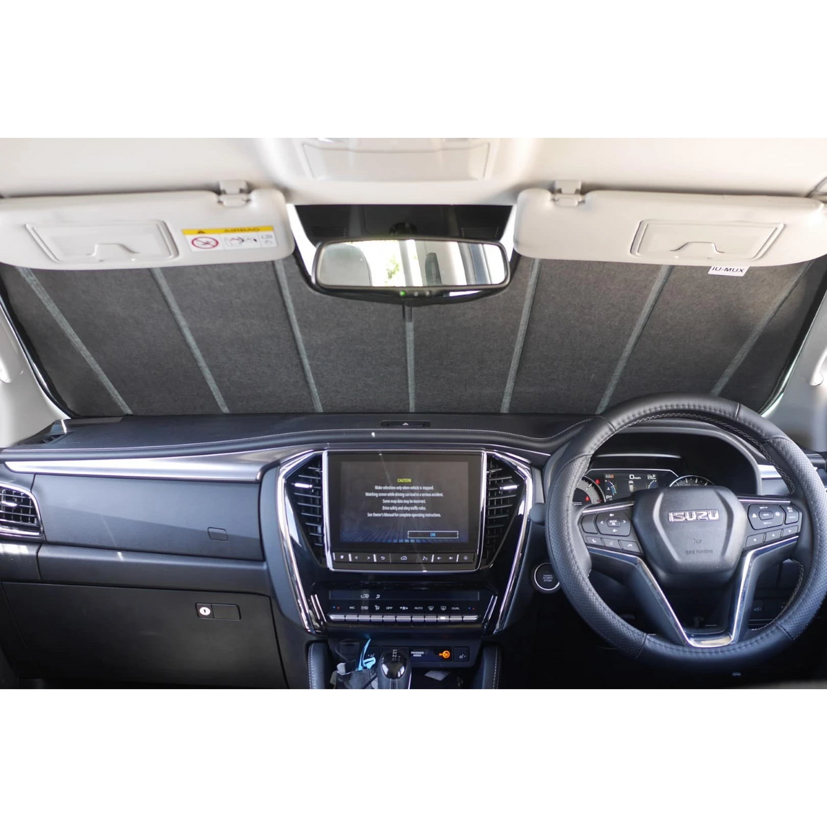 Isuzu D-MAX interior with the windscreen shade fitted – SnapShades Front Windscreen Isuzu MU-X, D-MAX