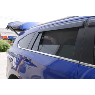 SnapShades Isuzu MU-X Rear Window Shades (RJ 2020+) – blue MU-X with a roof rack in a car park, shades fitted