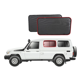Two side window sunshades with a white Troopcarrier – SnapShades Second Row Side Port Windows Suit 75/78 Troopcarrier