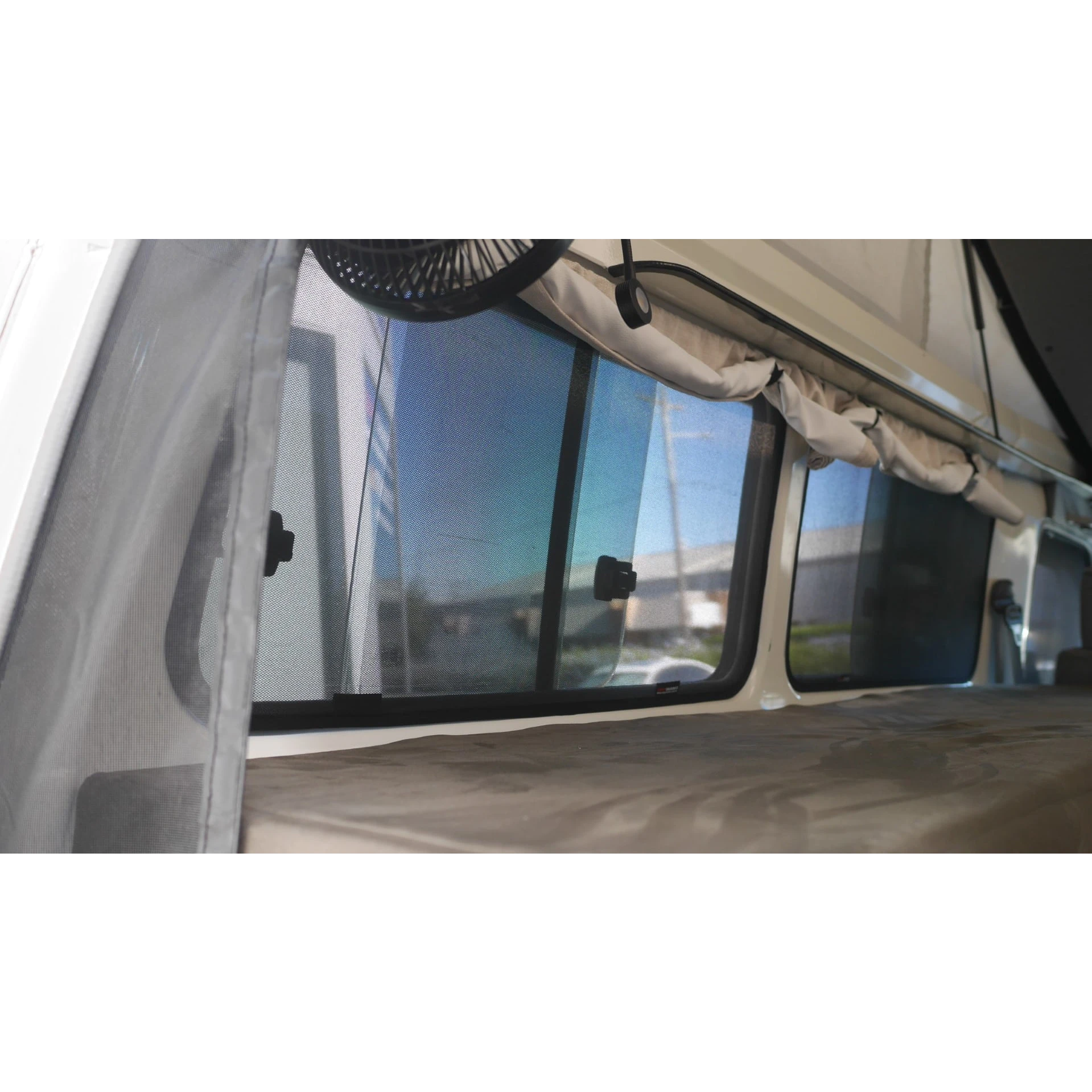 Troopcarrier side window with SnapShade fitted, viewed from inside