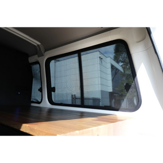 Troopcarrier rear interior with third row window shade fitted – SnapShades Third Row Side Port Windows Suit 75/78 Troopcarrier