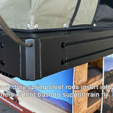 Heavy-duty spring steel rods supporting a rain fly on a tent base.