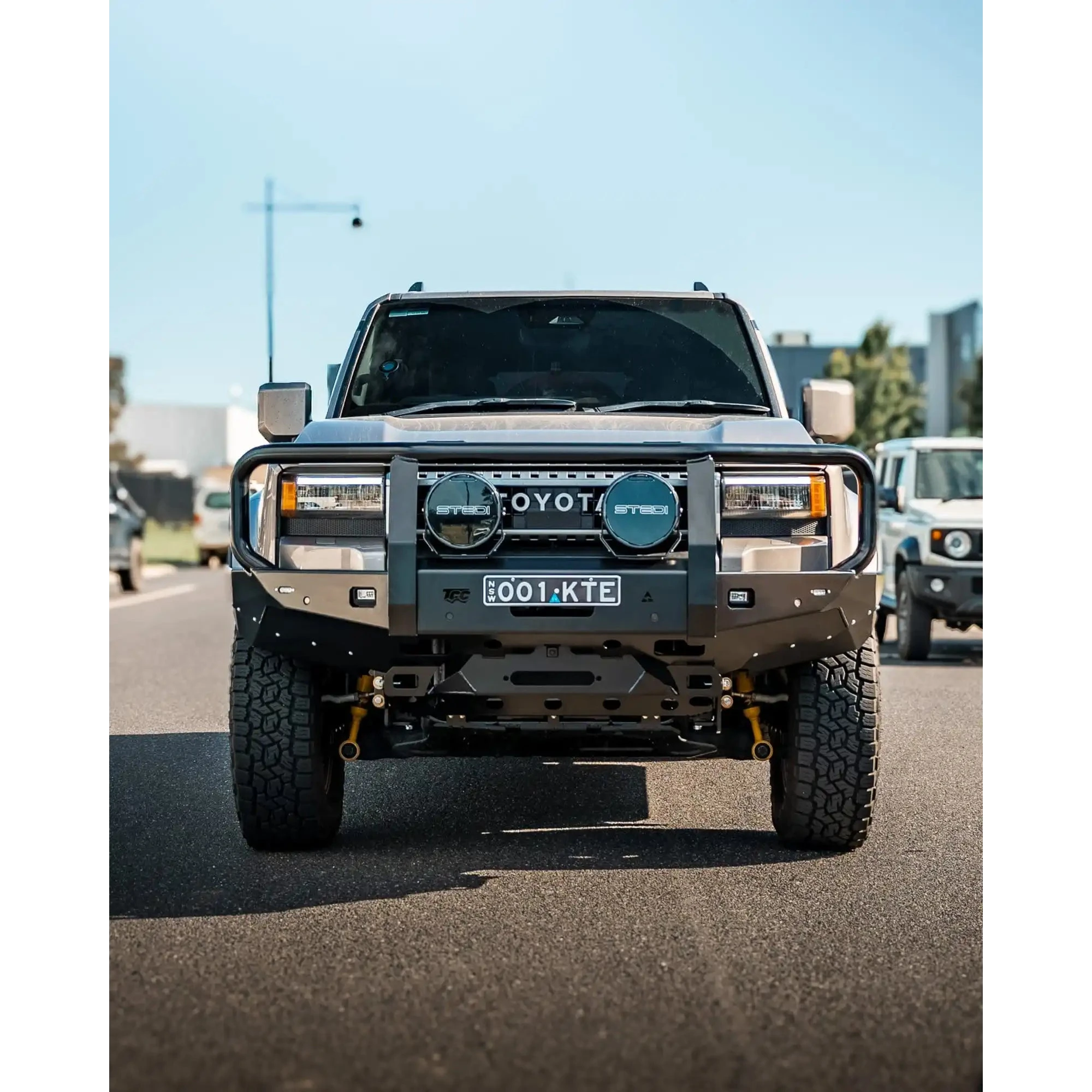 Toyota Prado 250 fitted with the TCC 250 Prado Bull Bar on a road