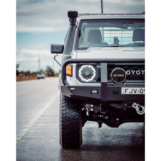 White off-road vehicle with custom modifications on a road – TCC 70 Series Single Cab Bull Bar - Facelift (2024 - Present)