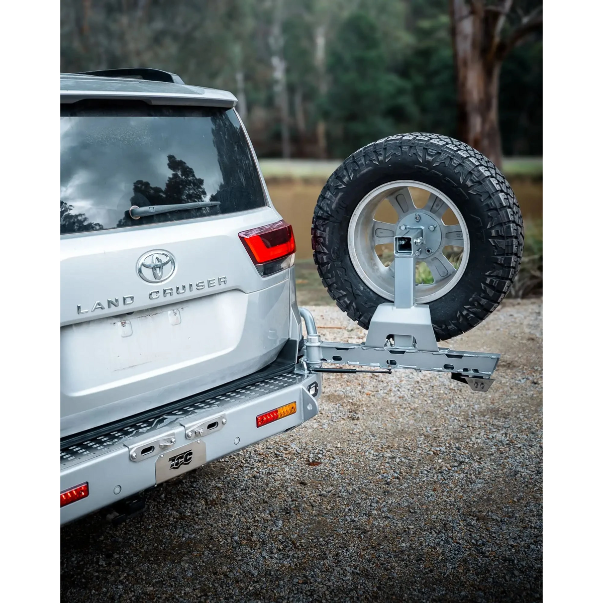 Silver Toyota Land Cruiser with a spare tire mounted – TCC Toyota LC300 Series Rear Bar