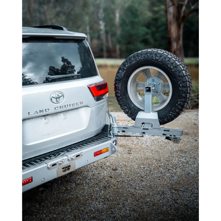 Silver Toyota Land Cruiser with a spare tire mounted – TCC Toyota LC300 Series Rear Bar