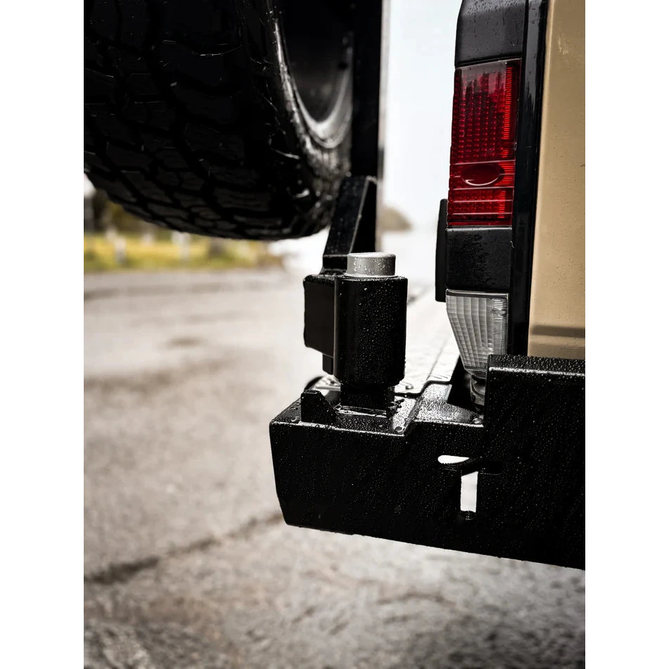 Thorburns LC75/78 Rear Bar – close-up of a tow bar attached to a vehicle's hitch receiver.