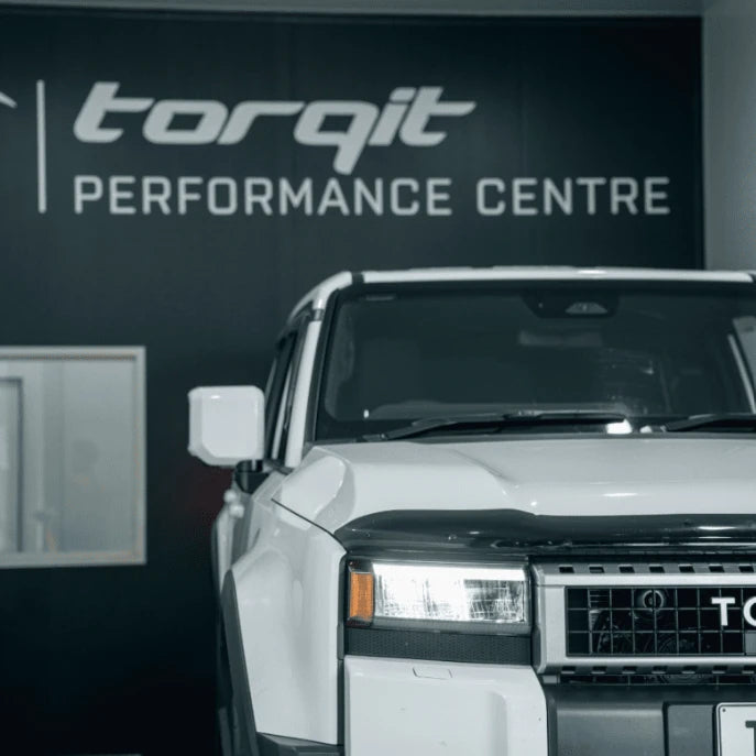 White Toyota Prado outside the Torqit Performance Centre – Torqit 3″ DPF Back Performance Exhaust Toyota Prado 250 Series 2.8L 2024+