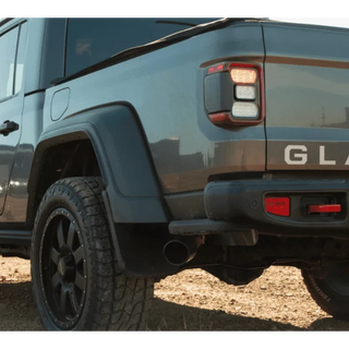 Close-up of a blue Jeep Gladiator in an outdoor setting
