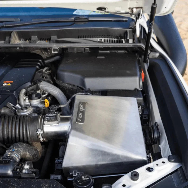 Engine bay with bonnet open showing the airbox – Torqit Stainless Steel Airbox (Matte Black) for Toyota 300 Series Landcruiser