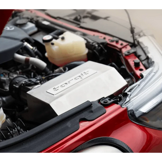Torqit airbox in the engine bay of a red Hilux – Torqit Stainless Steel Airbox (Matte Black) for Toyota Hilux 2.8L