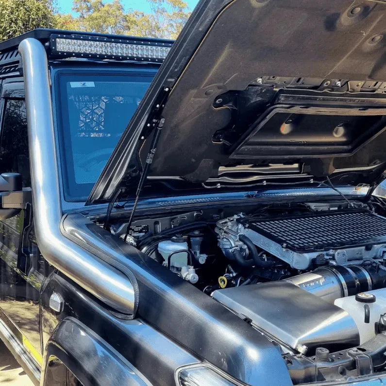 Bonnet open showing the snorkel intake connection in the engine bay – Torqit 4" Stainless Steel Snorkel (Matte Black) for Toyota 76 Series Landcruiser