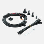 Wiring harness kit with connectors and cables on a white background