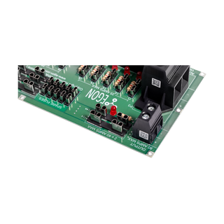 Close-up of one end of the DC Hub board, showing the spare fuse holder, the 2 x 40 amps max fuse pair, the 80 amps max output terminal and the indicator LED beside each circuit