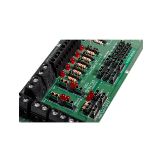 Close-up along the DC Hub board showing the individual blade fuses, the resistor and LED for each output circuit, the numbered output terminal strip and the DC HUB 150 part marking on the board
