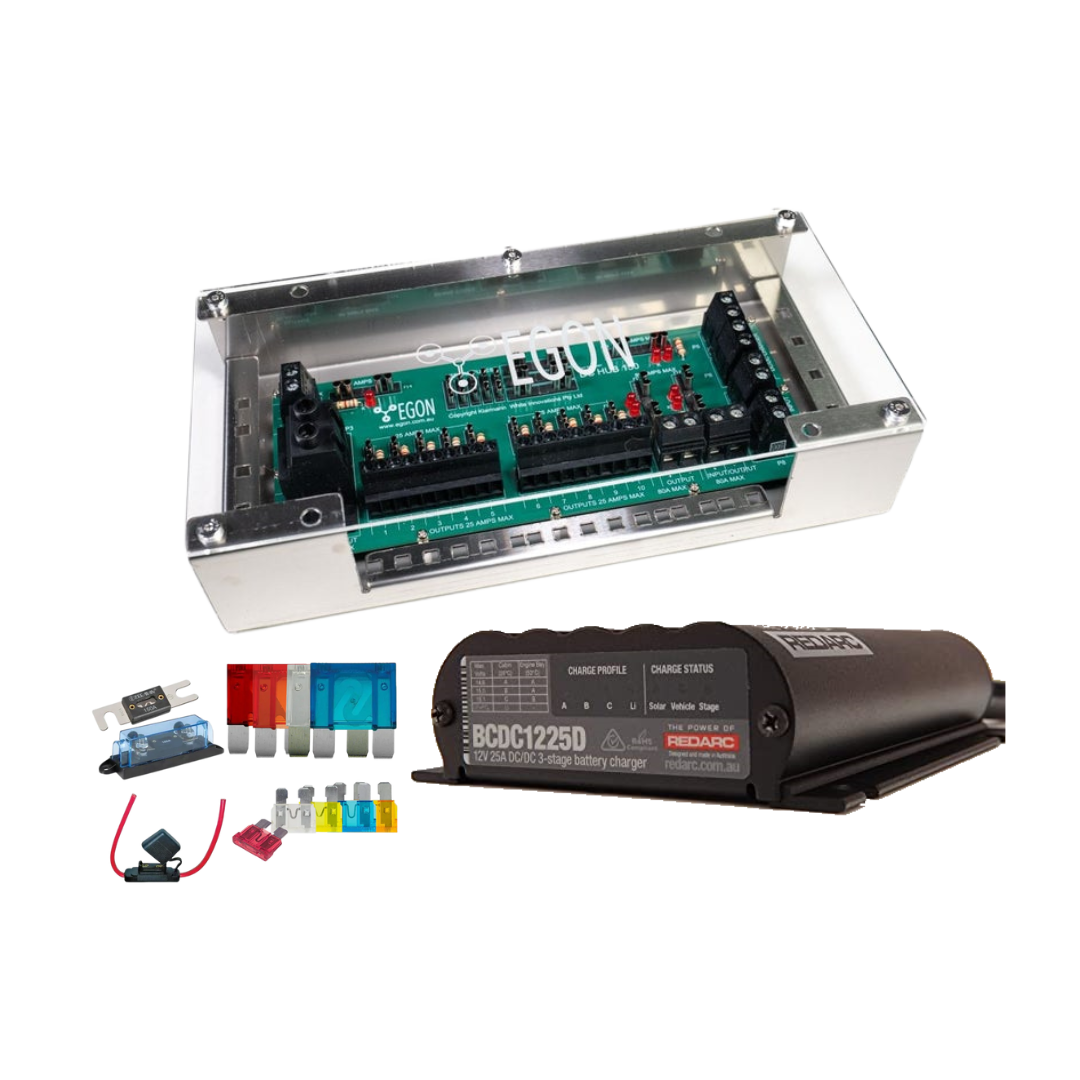 BCDC1225D kit shown without an inverter: the EGON DC Hub in its clear-lidded case above a Redarc BCDC1225D charger, an ANL fuse and holder, and a set of blade and mega fuses
