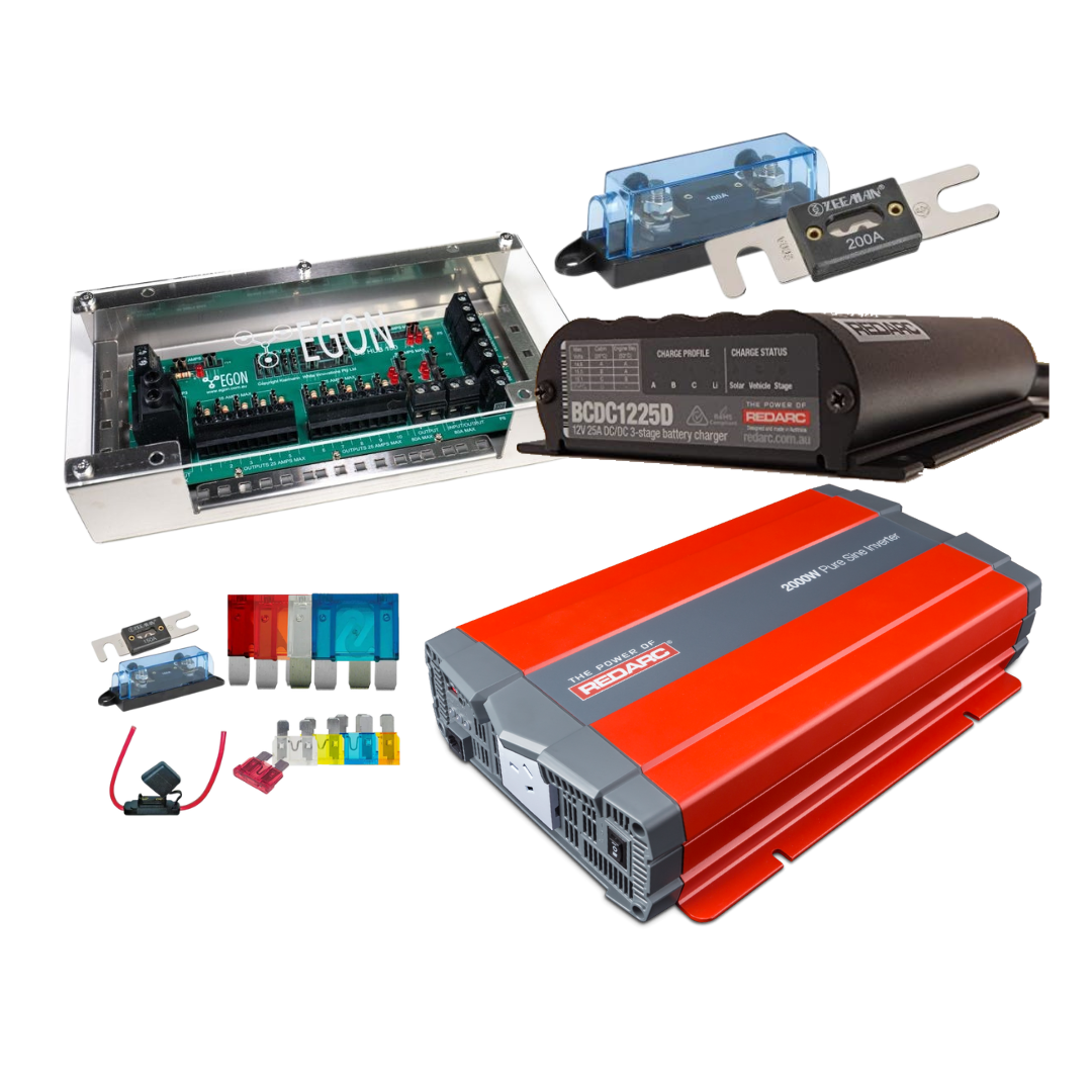 BCDC1225D kit with the EGON DC Hub in its clear-lidded case, a Redarc BCDC1225D 12V 25A DC to DC three stage charger, a Redarc 2000W pure sine inverter, a 200A ANL fuse and holder, and a set of blade and mega fuses